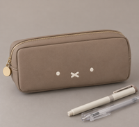Pencil case with embroidery and a zipper